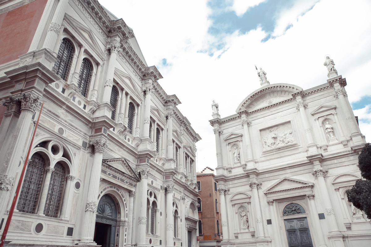 Visit Scuola Grande di San Rocco.